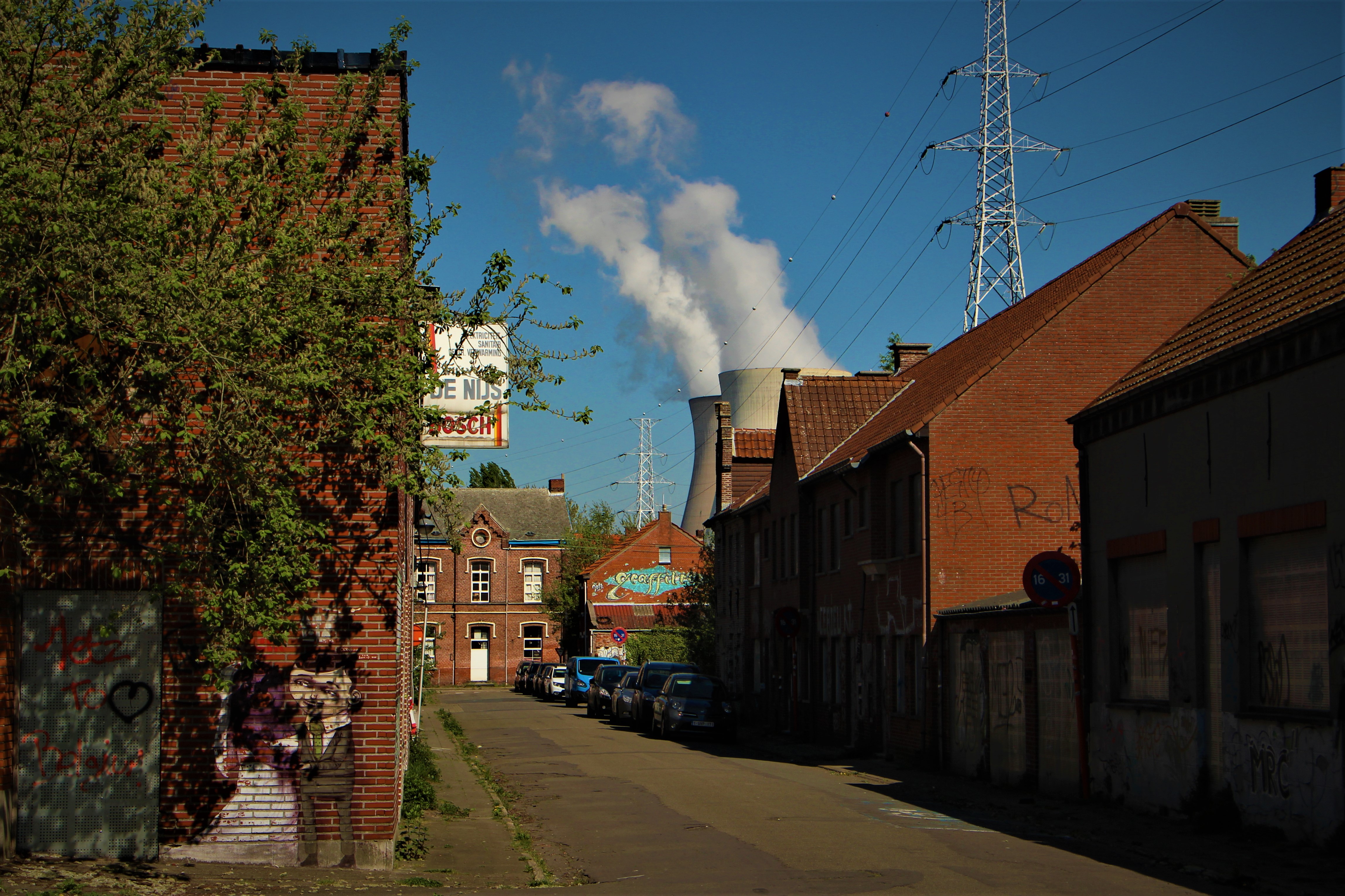 A dystopian nuclear plant looms over abandoned Doel
